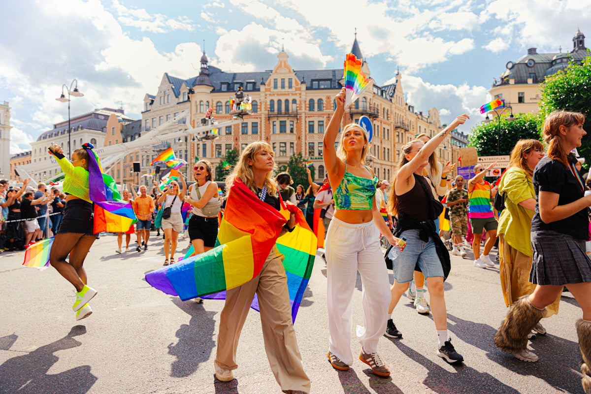 People are celebrating pride with rainbow flags