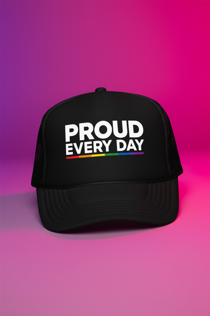 Flaunt It black structured 5-panel cap with Proud Every Day text and rainbow accent worn by a man in a coffee shop