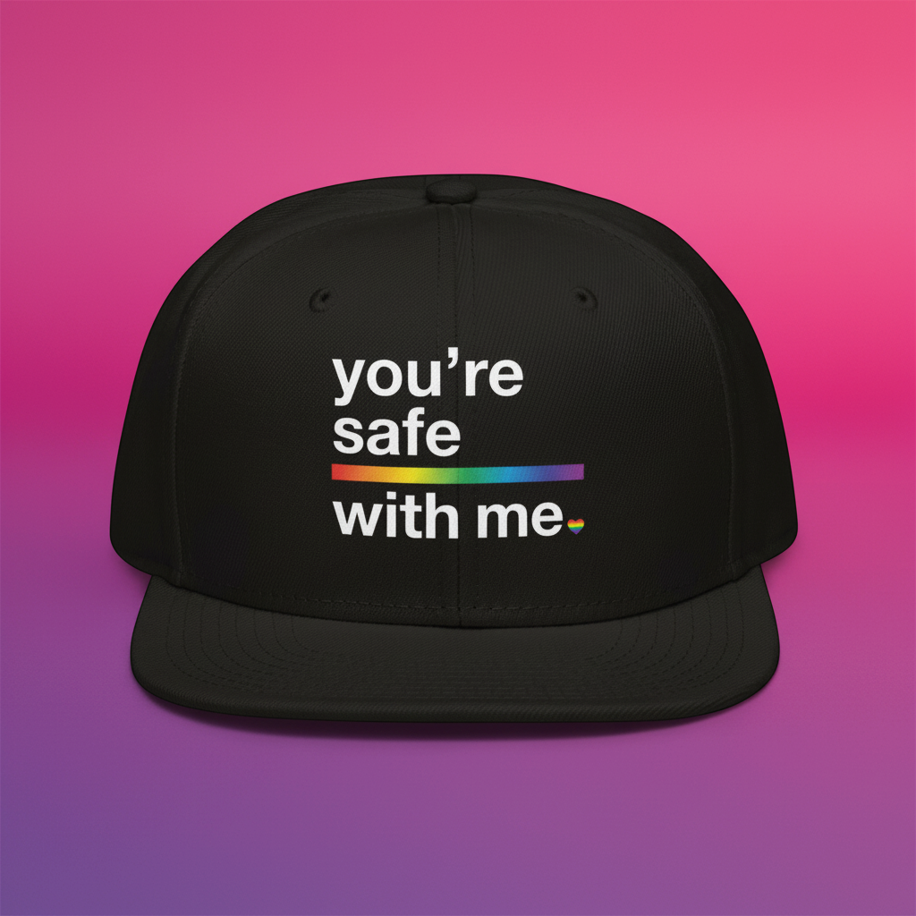 Flaunt It black structured snapback hat featuring the text You're Safe With Me with a rainbow graphic underline.