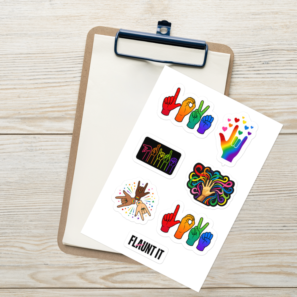 Flaunt It ASL Pride sticker sheet featuring colorful hand signs and rainbow designs on a clipboard.