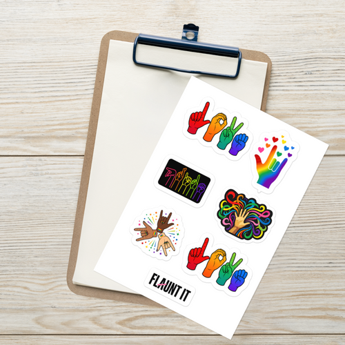 Flaunt It ASL Pride sticker sheet featuring colorful hand signs and rainbow designs on a clipboard.