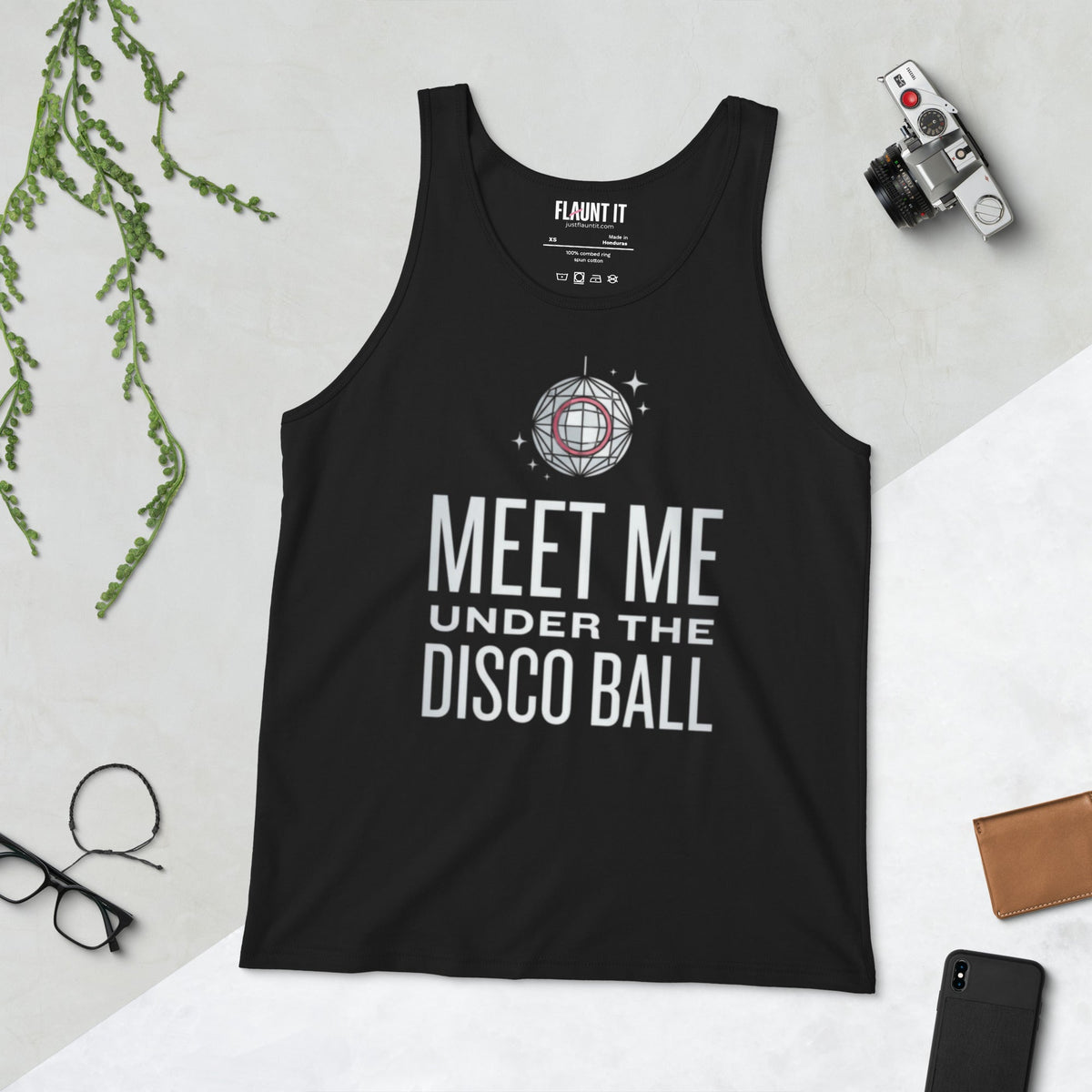 Flaunt It black cotton tank top featuring a disco ball graphic and Meet Me Under the Disco Ball text in silver.