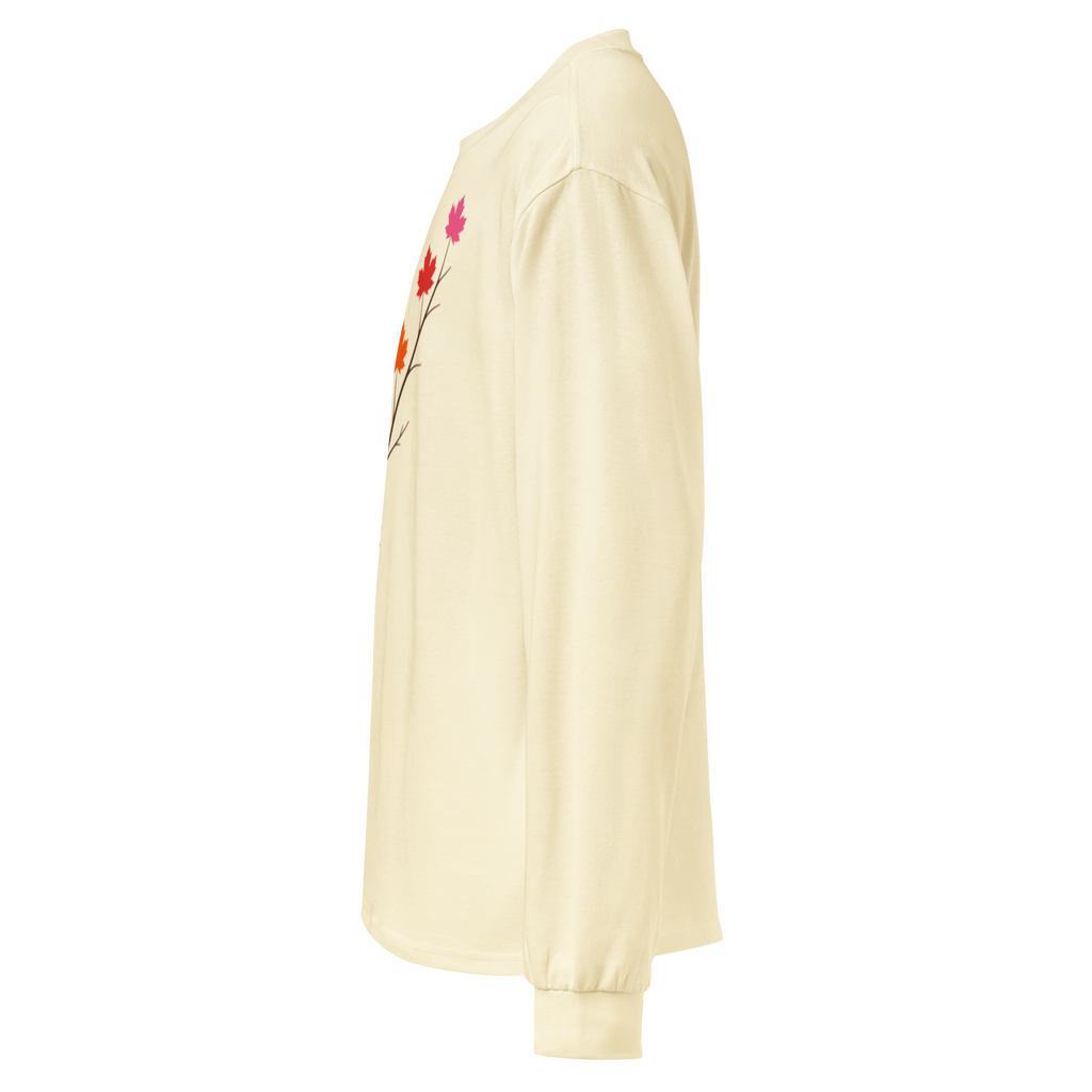 Side view of a cream-colored Flaunt It heavyweight long sleeve shirt featuring a pride maple leaf branch graphic.