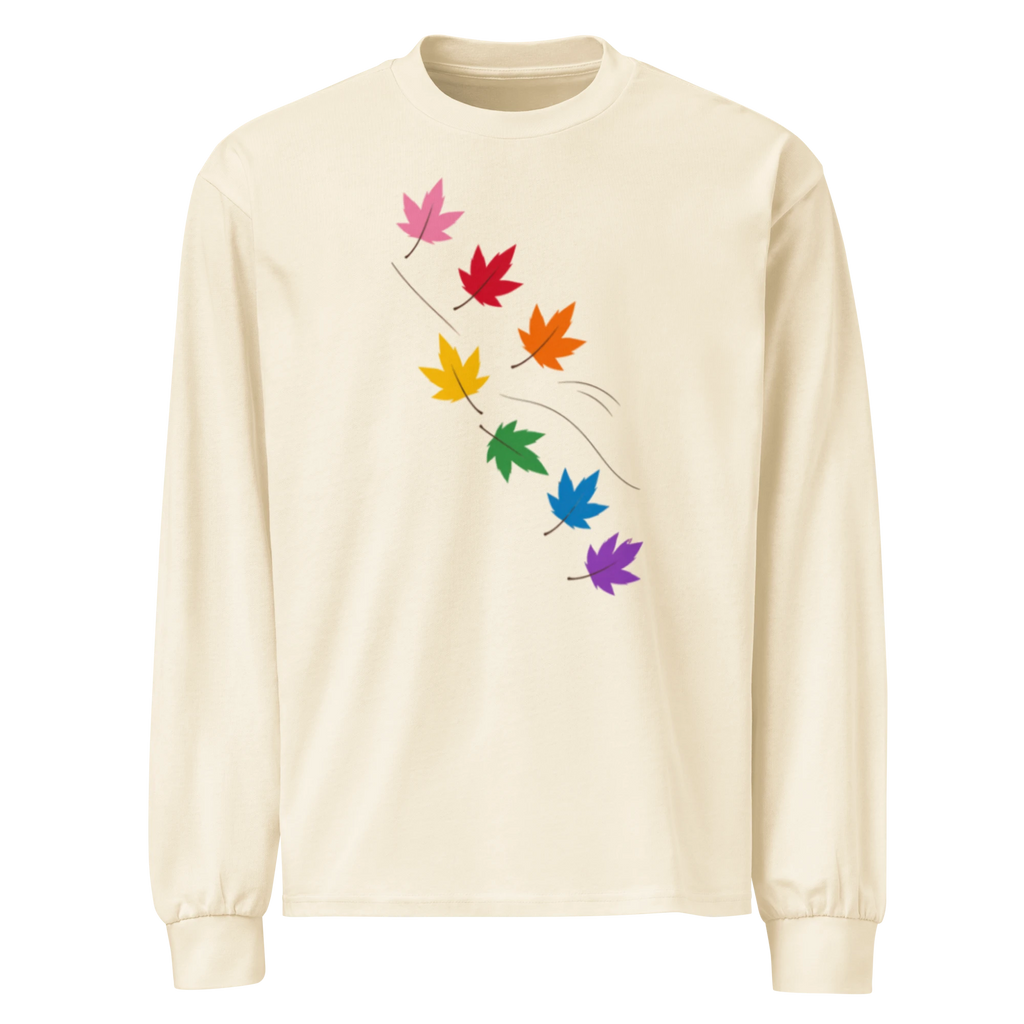 Flaunt It cream heavyweight long sleeve shirt featuring a diagonal graphic of seven colorful pride maple leaves.