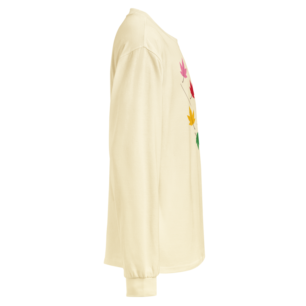 Flaunt It cream heavyweight long sleeve shirt featuring a diagonal graphic of colorful pride maple leaves, side view.