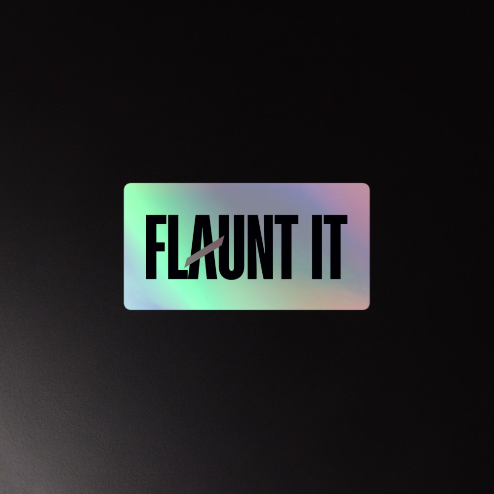 Flaunt It holographic vinyl logo sticker with a 3D embossed effect on a dark background.