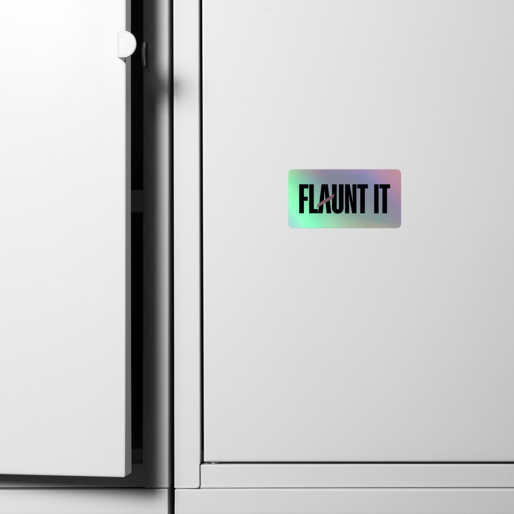 Flaunt It holographic vinyl sticker with a 3D embossed logo applied to a white indoor cabinet surface.