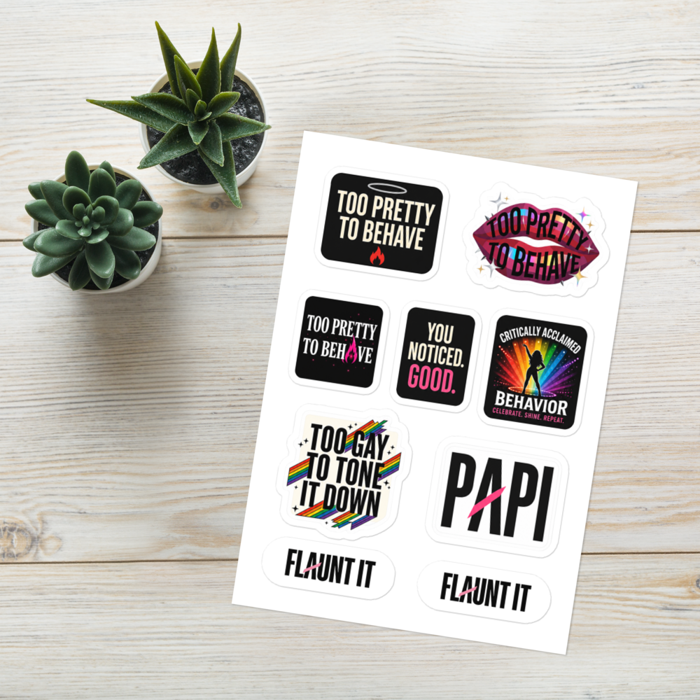 Flaunt It Main Character Energy sticker sheet with seven glossy, colorful statement stickers on a wooden table.