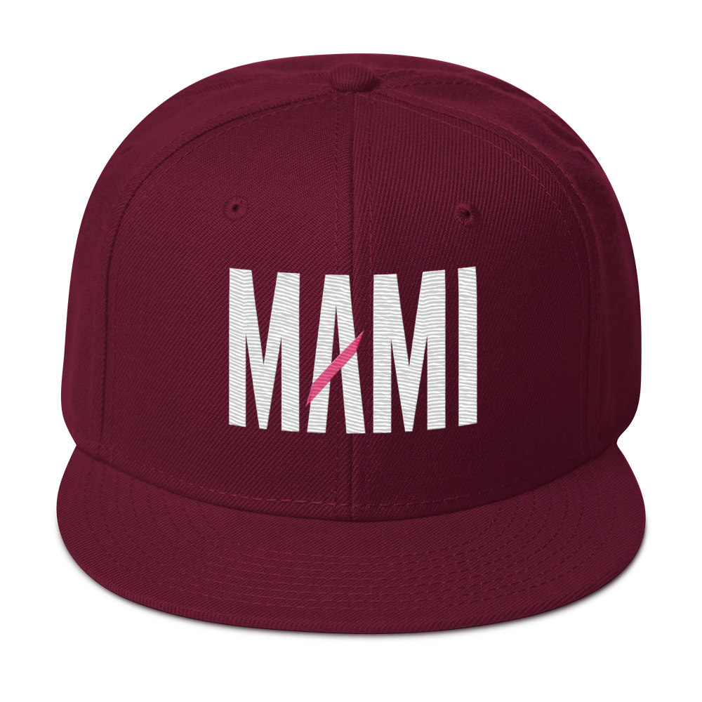 Flaunt It structured snapback hat in burgundy with white MAMI embroidery and a pink diagonal slash detail.