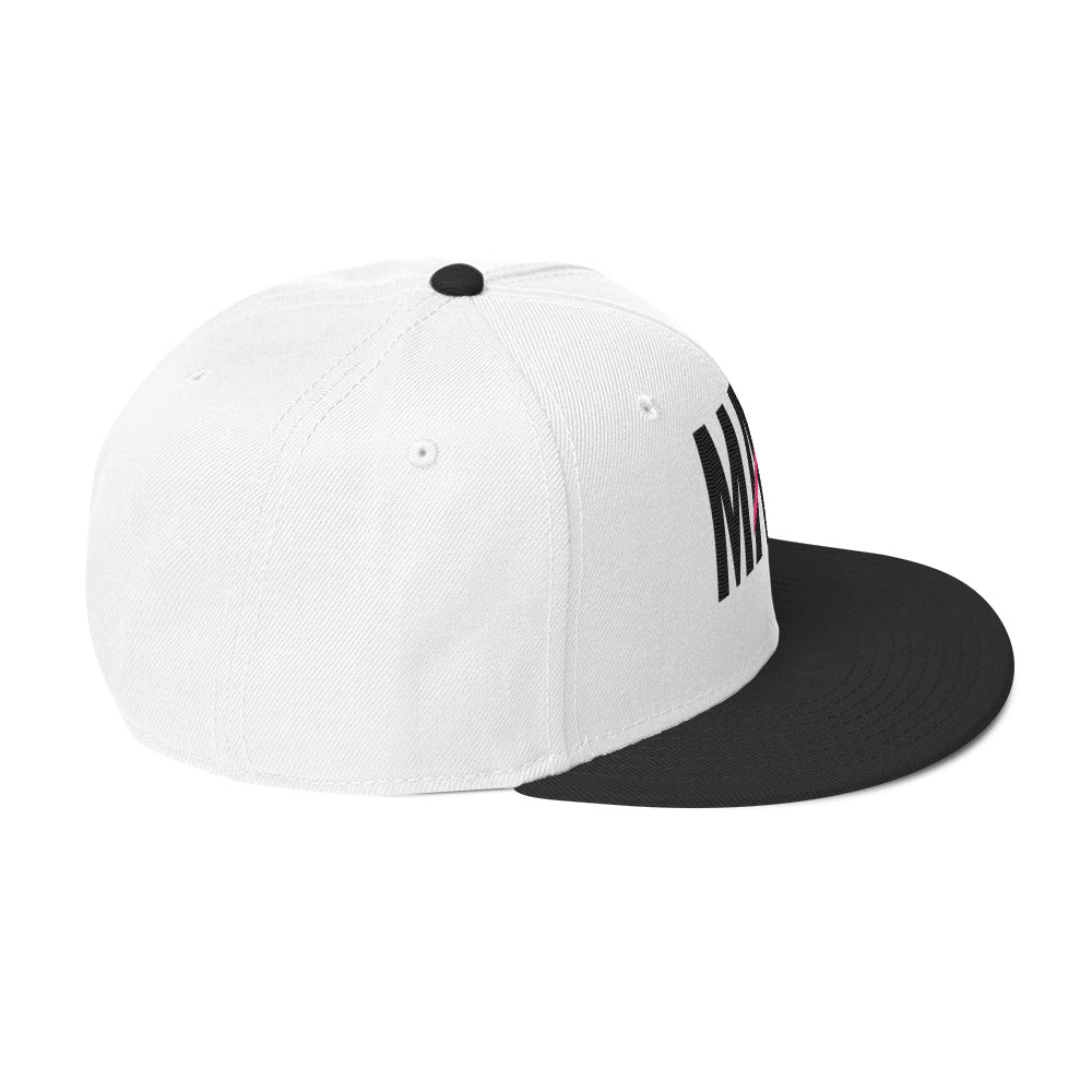 Flaunt It Mami embroidered white snapback hat with a black brim and black lettering on a side profile view.