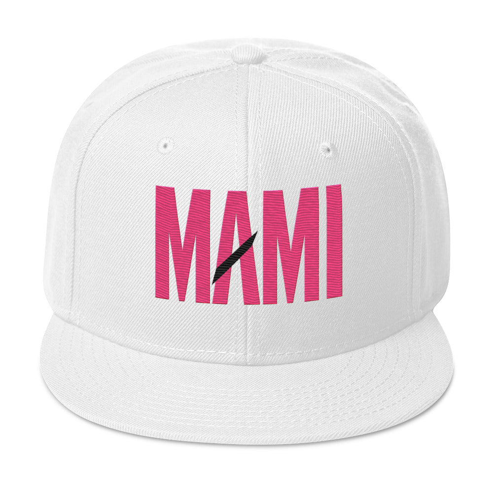 Flaunt It white structured snapback hat with MAMI embroidered in pink thread and a black diagonal slash detail.