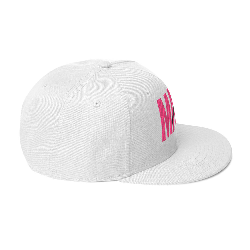 Flaunt It white structured snapback hat with MAMI embroidered in pink thread and a diagonal slash on the flat brim
