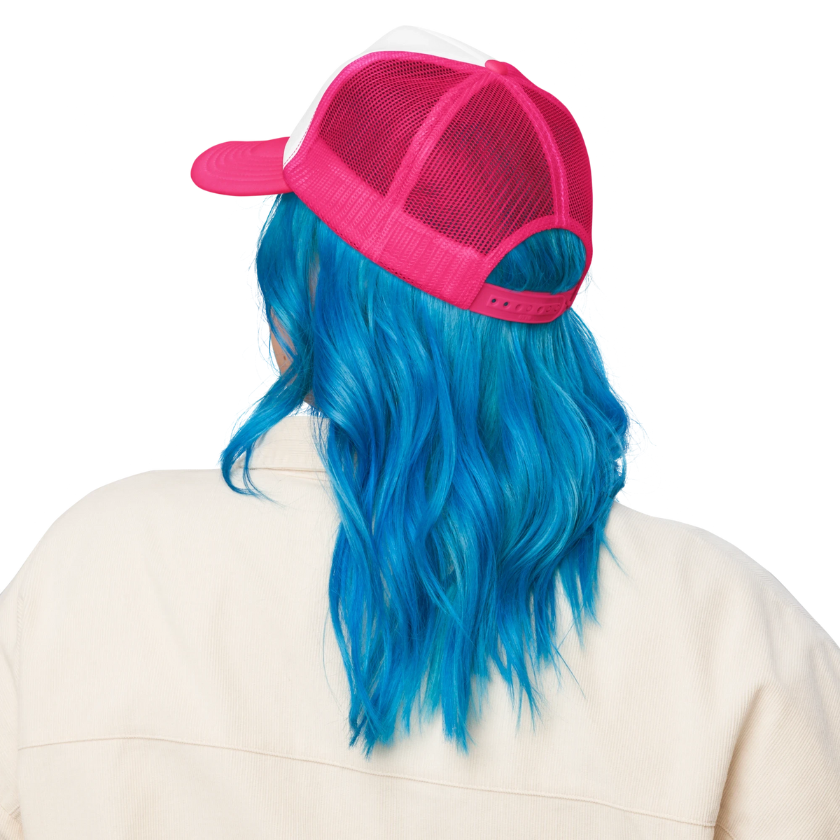 Flaunt It Mami premium unisex foam trucker hat in pink and white with mesh back, worn by a person with blue hair.