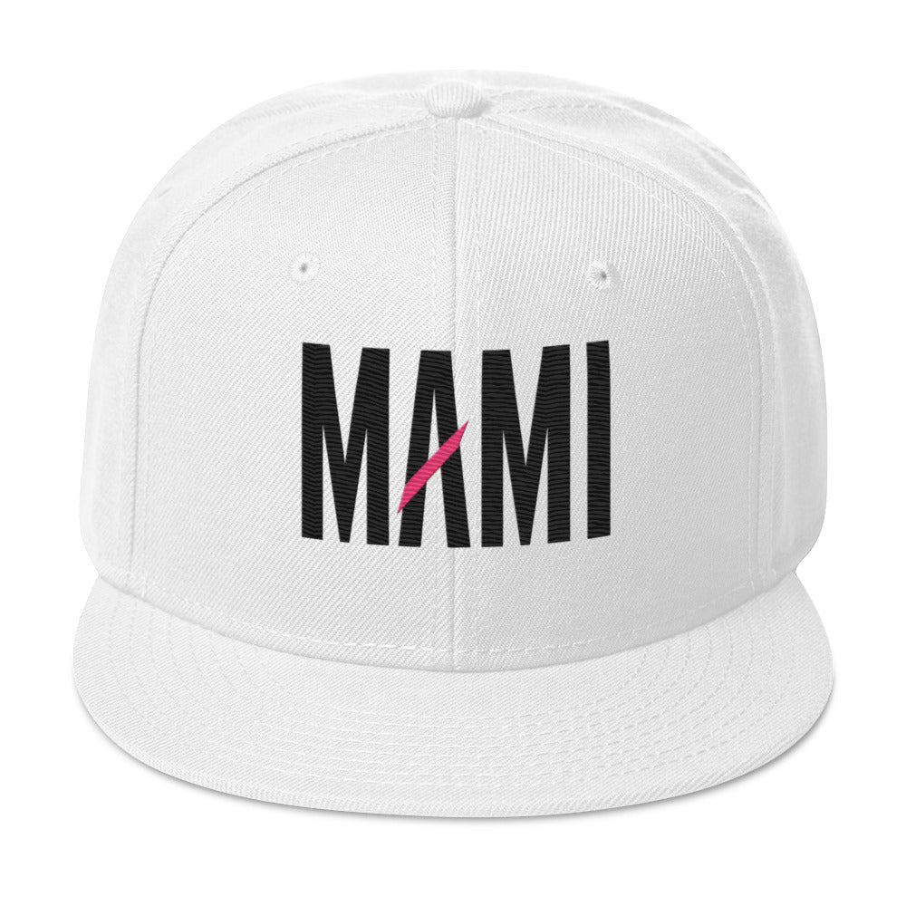 Flaunt It white structured snapback hat with MAMI embroidered in black thread and a pink diagonal slash detail.