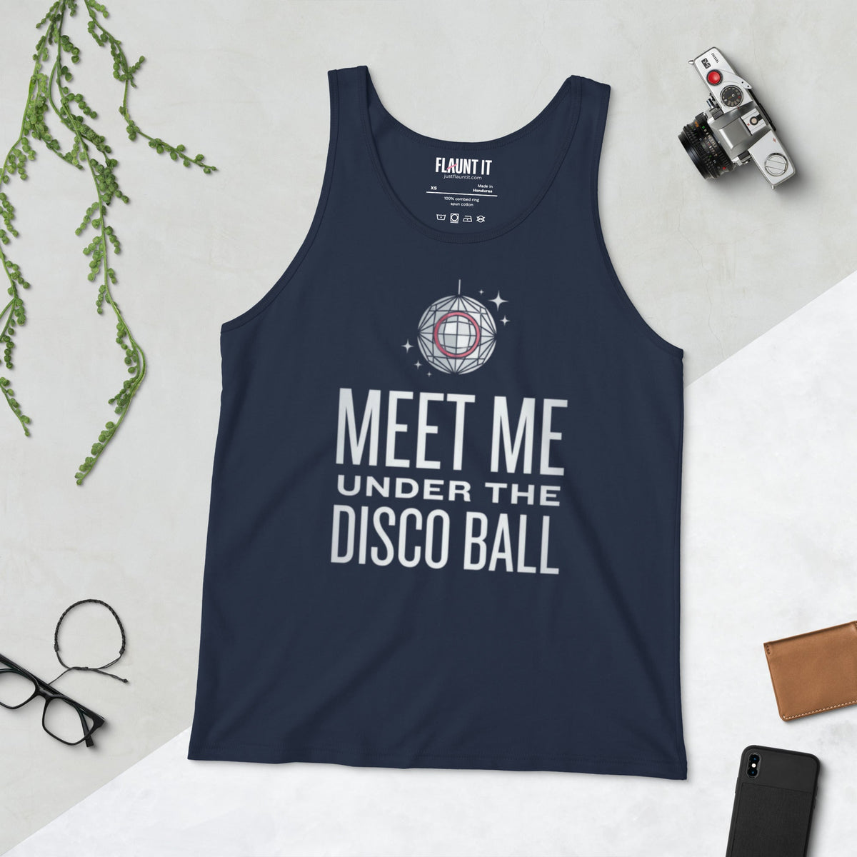 Flaunt It navy blue cotton tank top with Meet Me Under the Disco Ball graphic print on a flat lay background.