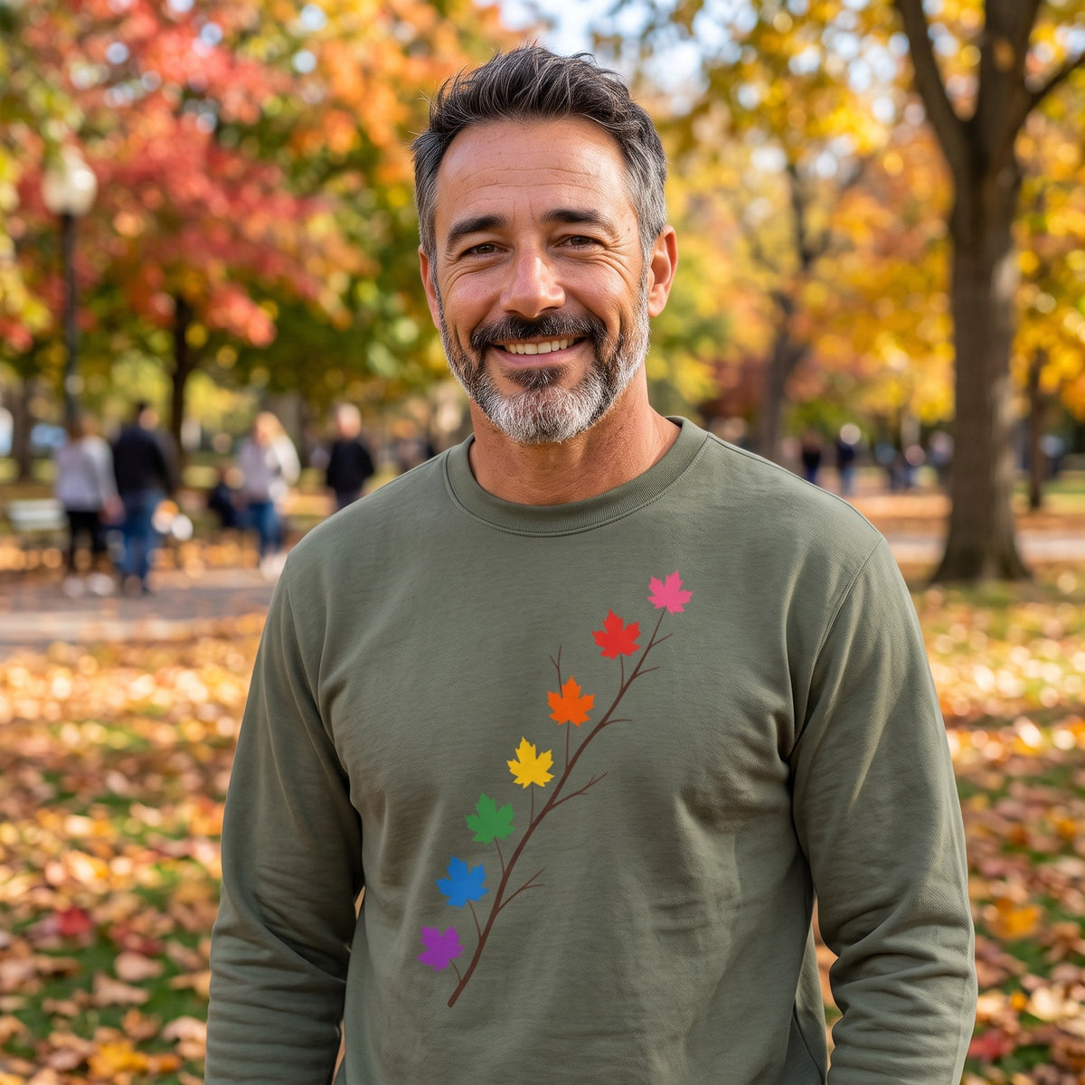 Flaunt It olive green heavyweight cotton long sleeve shirt with pride maple leaf branch graphic worn by a man