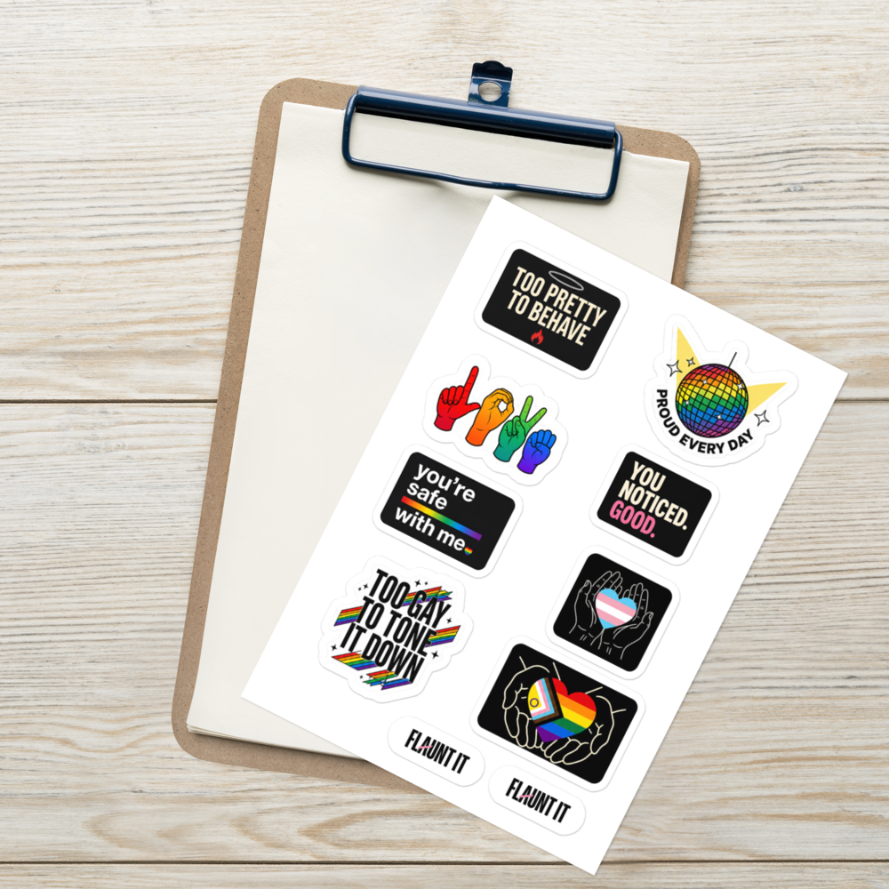 Flaunt It Proud All Year sticker sheet featuring eight colorful LGBTQ+ themed glossy stickers on a clipboard.