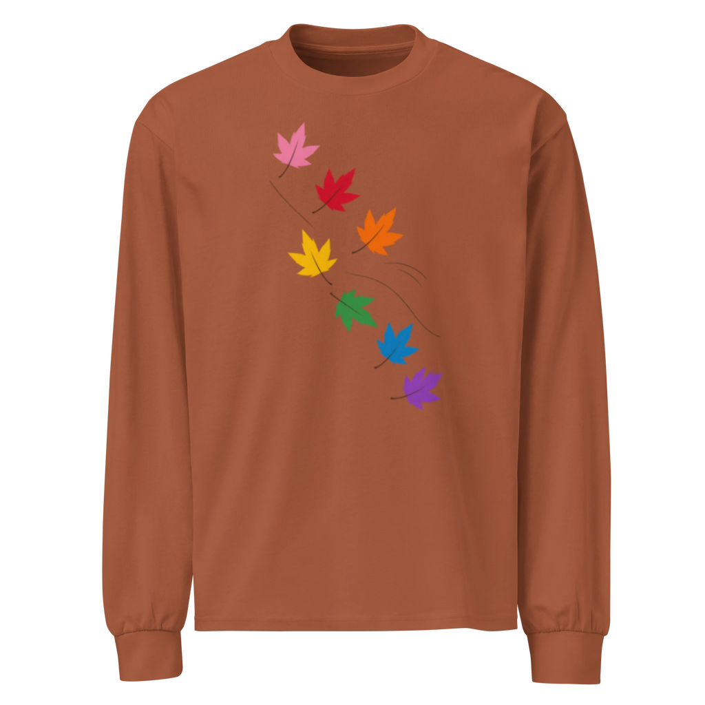 Flaunt It heavyweight long sleeve shirt in rust brown with a diagonal graphic of seven colorful pride maple leaves.