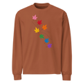 Flaunt It heavyweight long sleeve shirt in rust brown with a diagonal graphic of seven colorful pride maple leaves.