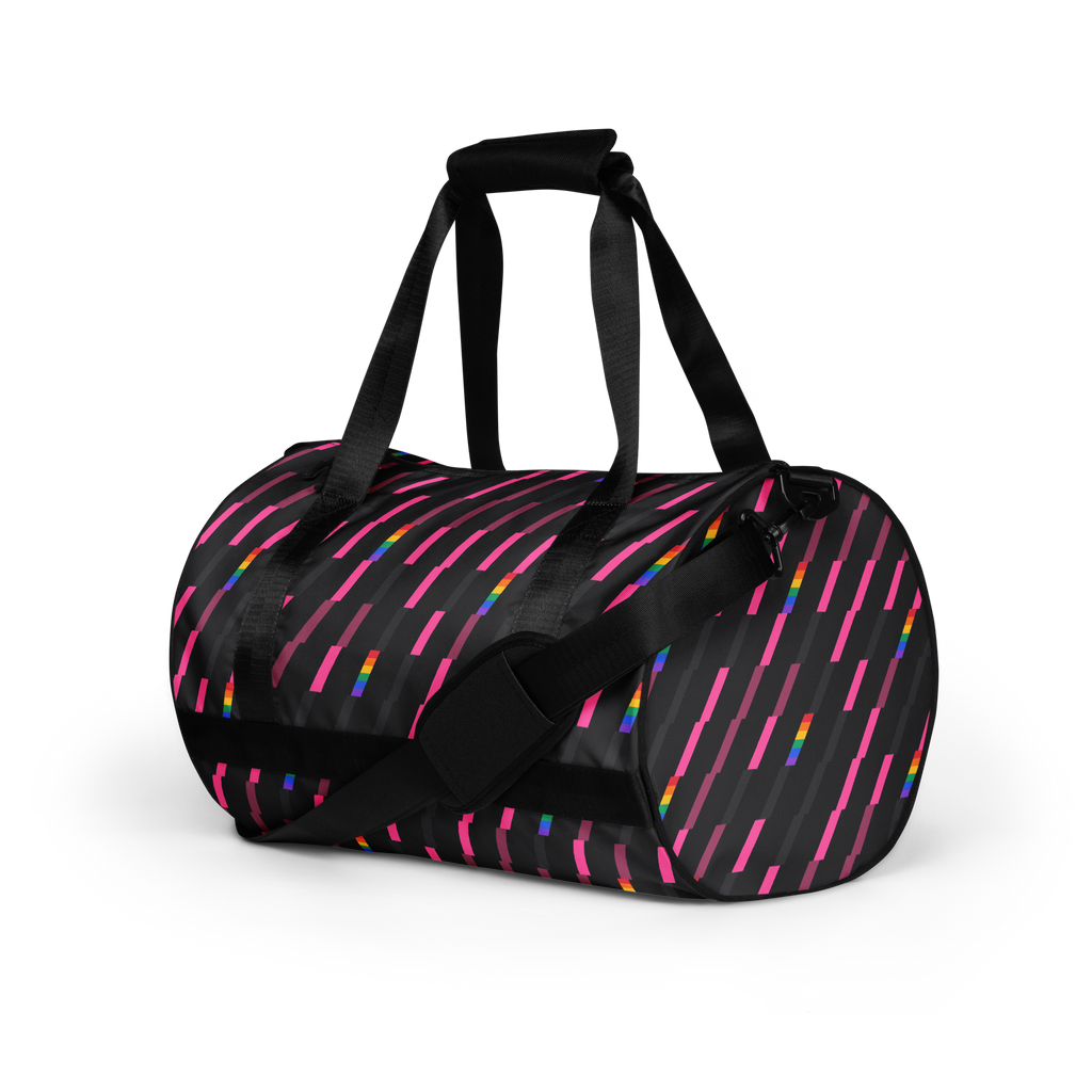 Flaunt It Signature Monogram gym bag in charcoal with pink diagonal slash pattern and subtle rainbow spectrum stripes.