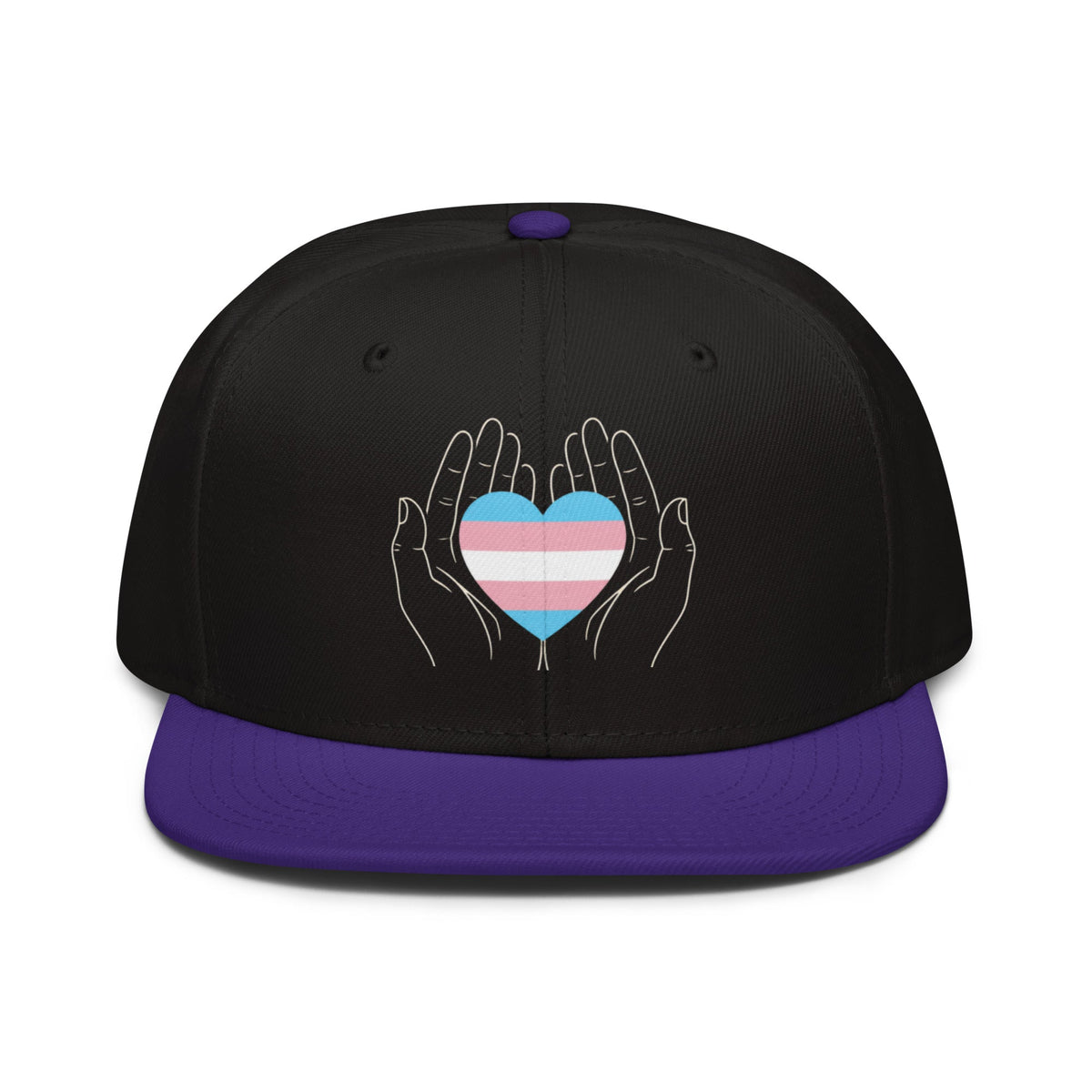Flaunt It snapback cap featuring a graphic of hands holding a trans pride heart on a black crown with a purple visor.
