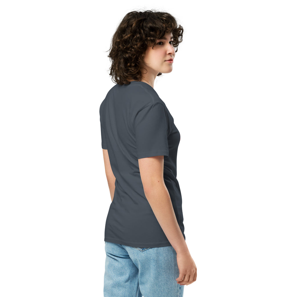 Right side view of a model wearing a petrol blue Una Cancion Mas premium unisex T-shirt.