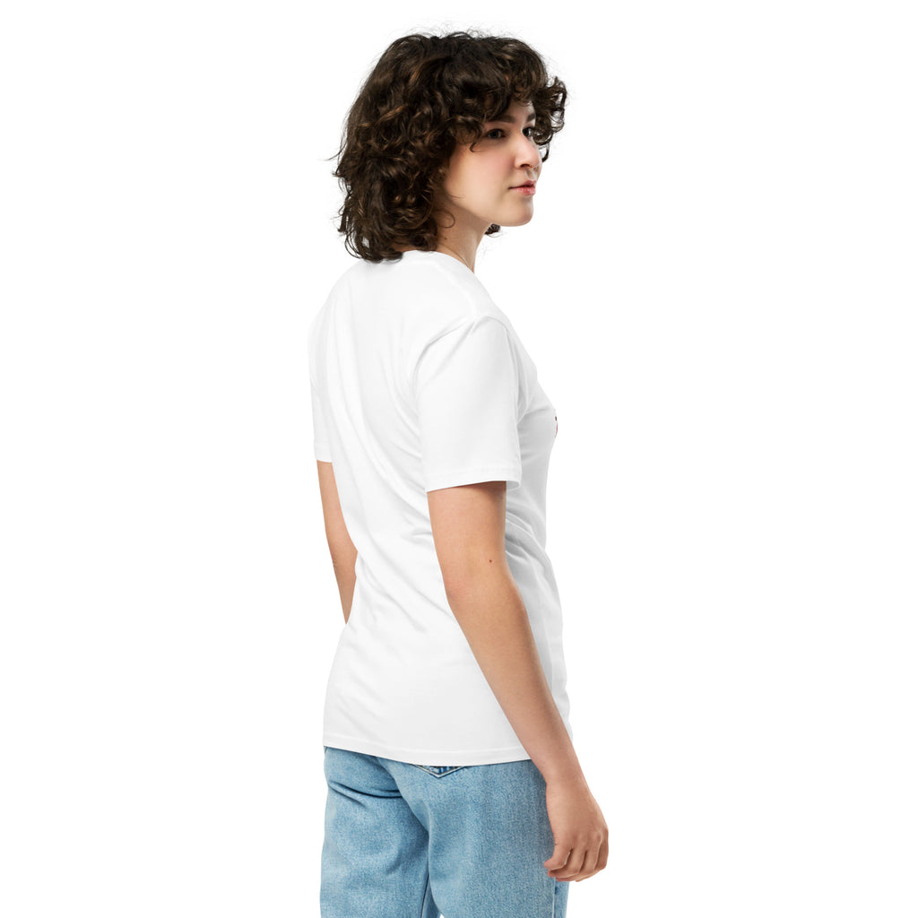 Right side view of a model wearing a white Una Cancion Mas premium unisex T-shirt.
